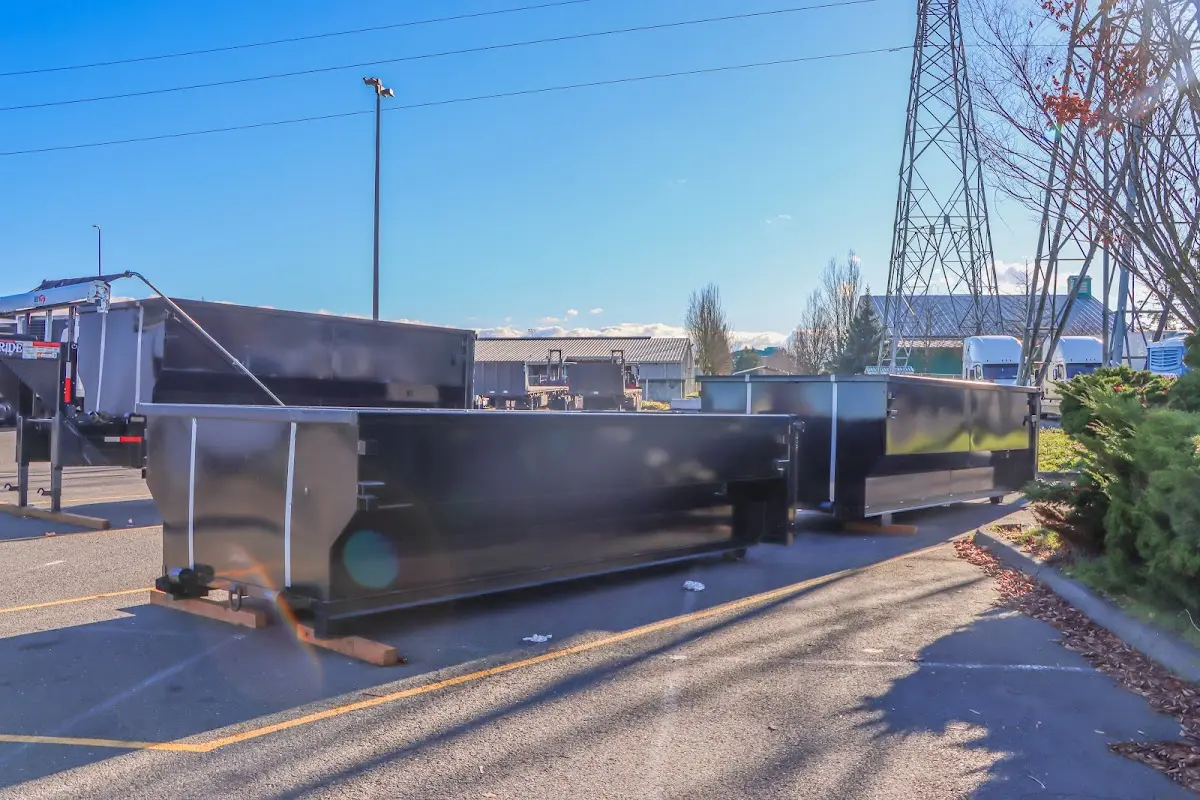 Roll-off dumpster ready for waste disposal at job site for Construction Dumpster Rental in East Lake-Orient Park